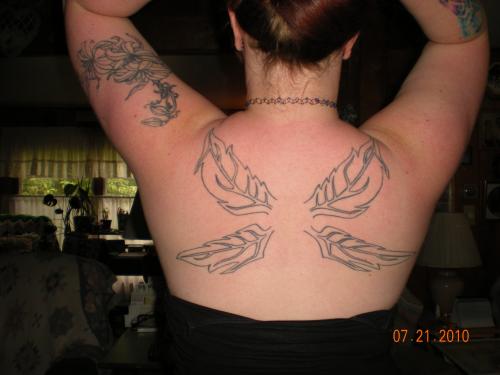 <img500*375:stuff/my_tats.jpg>